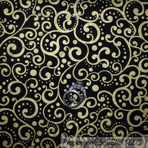 gold metallic quilting fabric|black fabric with gold metallic.